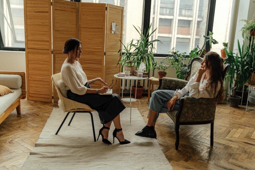 A woman getting bipolar disorder treatment through therapy.