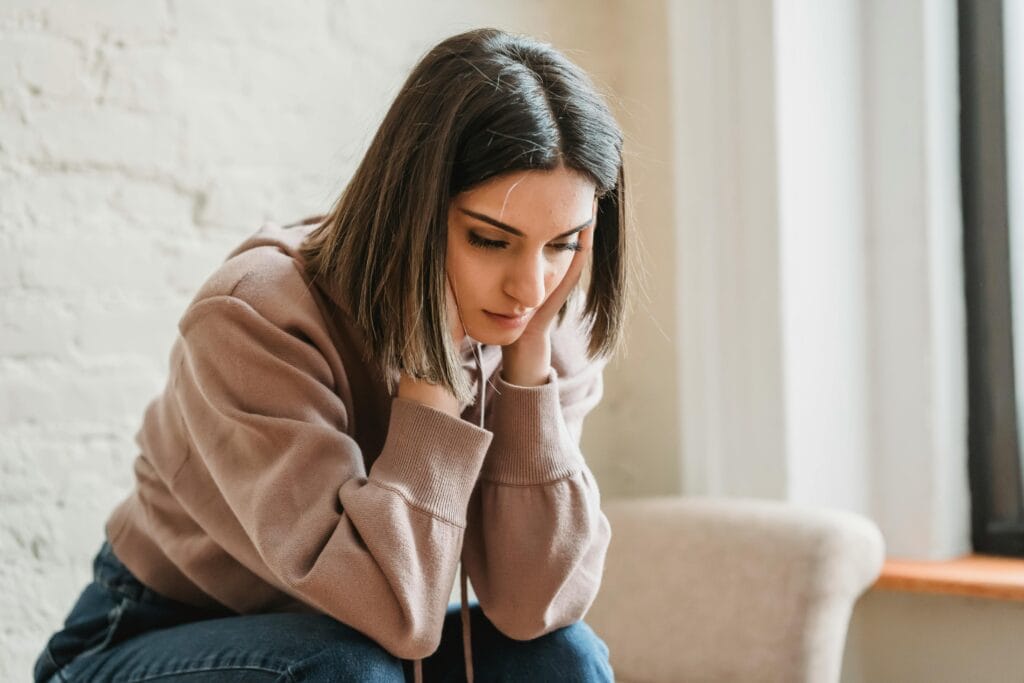 A person who is learning how to cope with loneliness during addiction recovery.