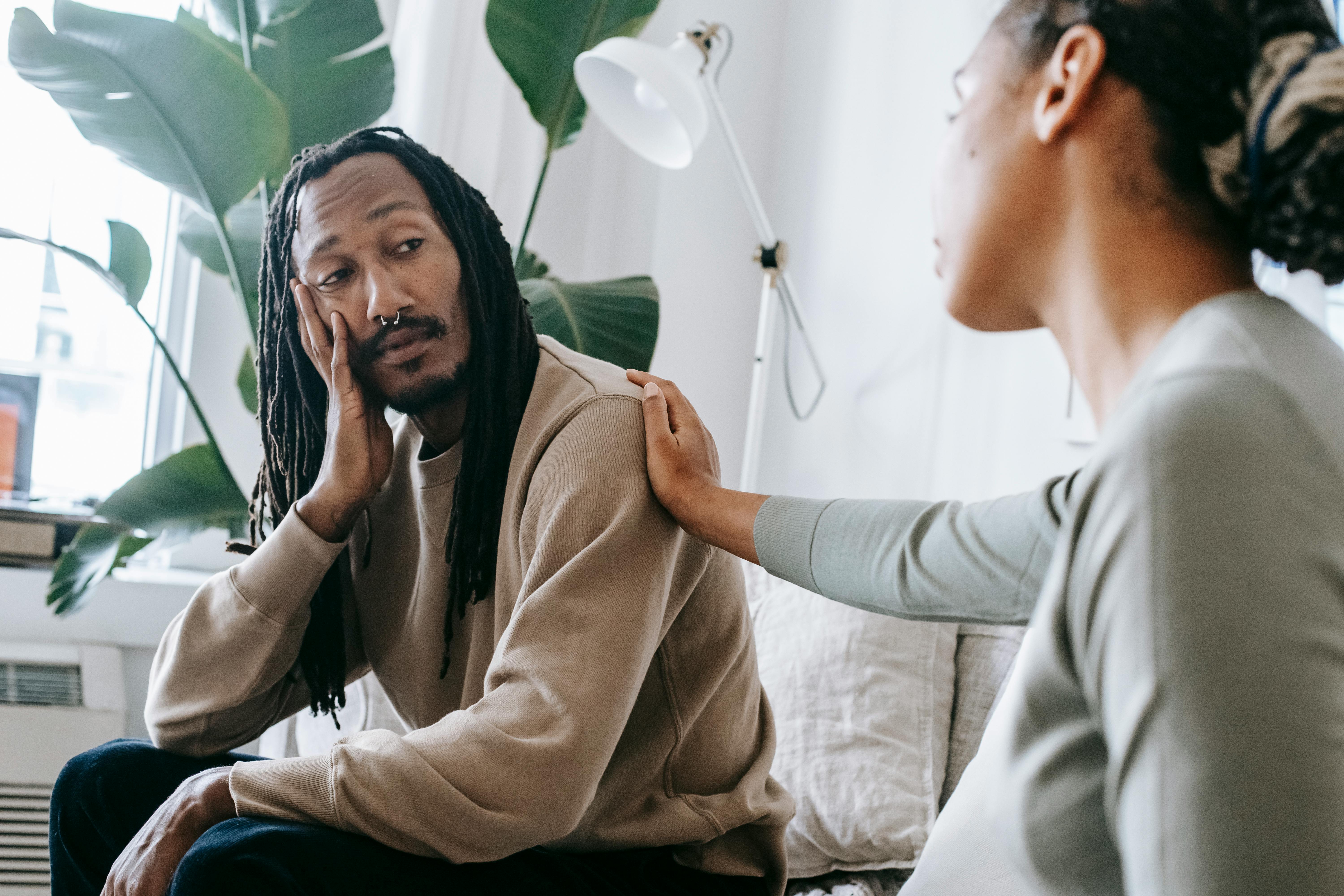 A person setting healthy boundaries with someone suffering from a drug addiction.
