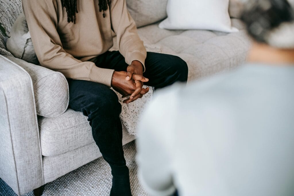 A person setting healthy boundaries with someone suffering from a drug addiction.