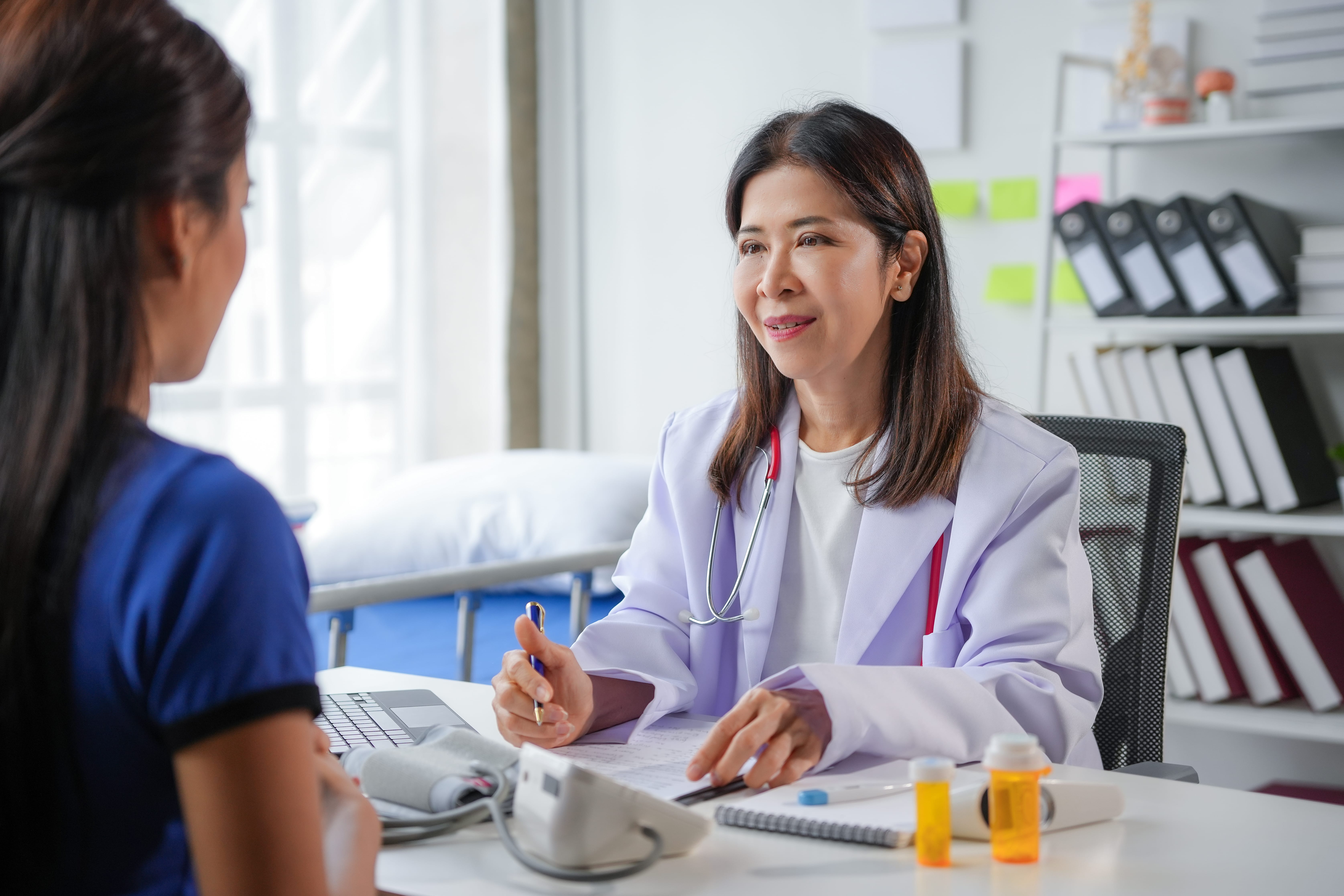 A patient discussing methadone and medication-assisted treatment (MAT) with their doctor.