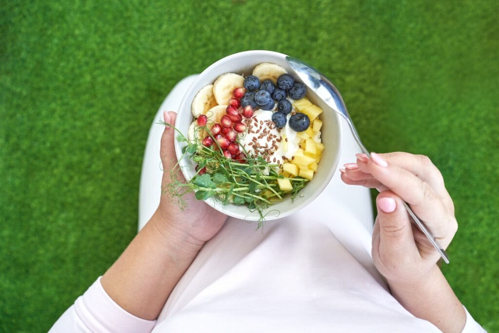 A person eating mood-boosting foods.