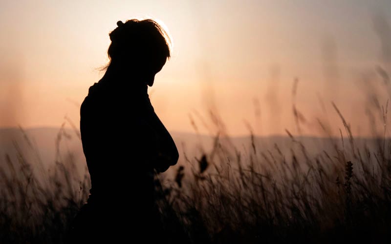 A person experiencing grief, loss, and the risk of substance misuse.